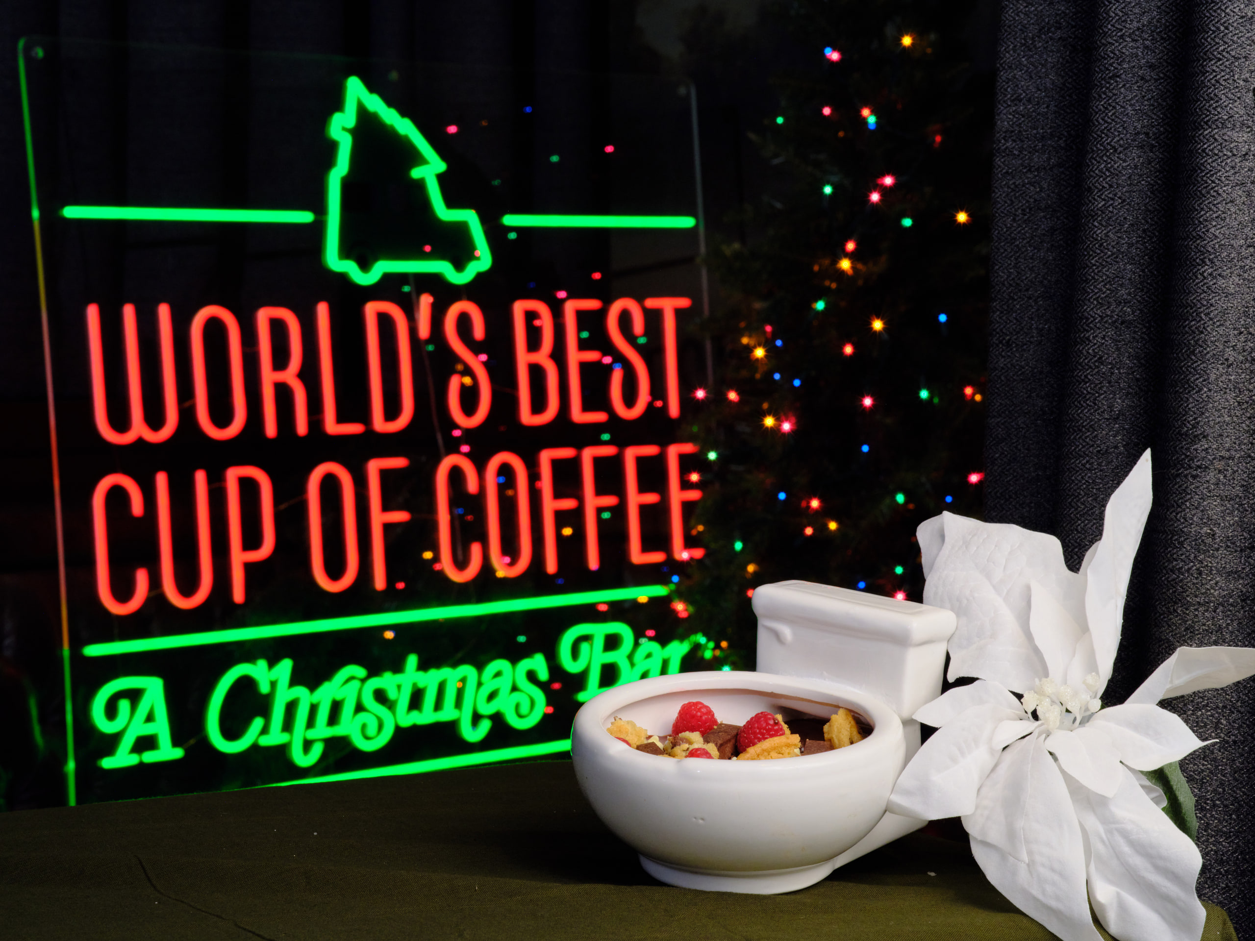 WORLD'S BEST CUP OF COFFEE in neon, green and red.