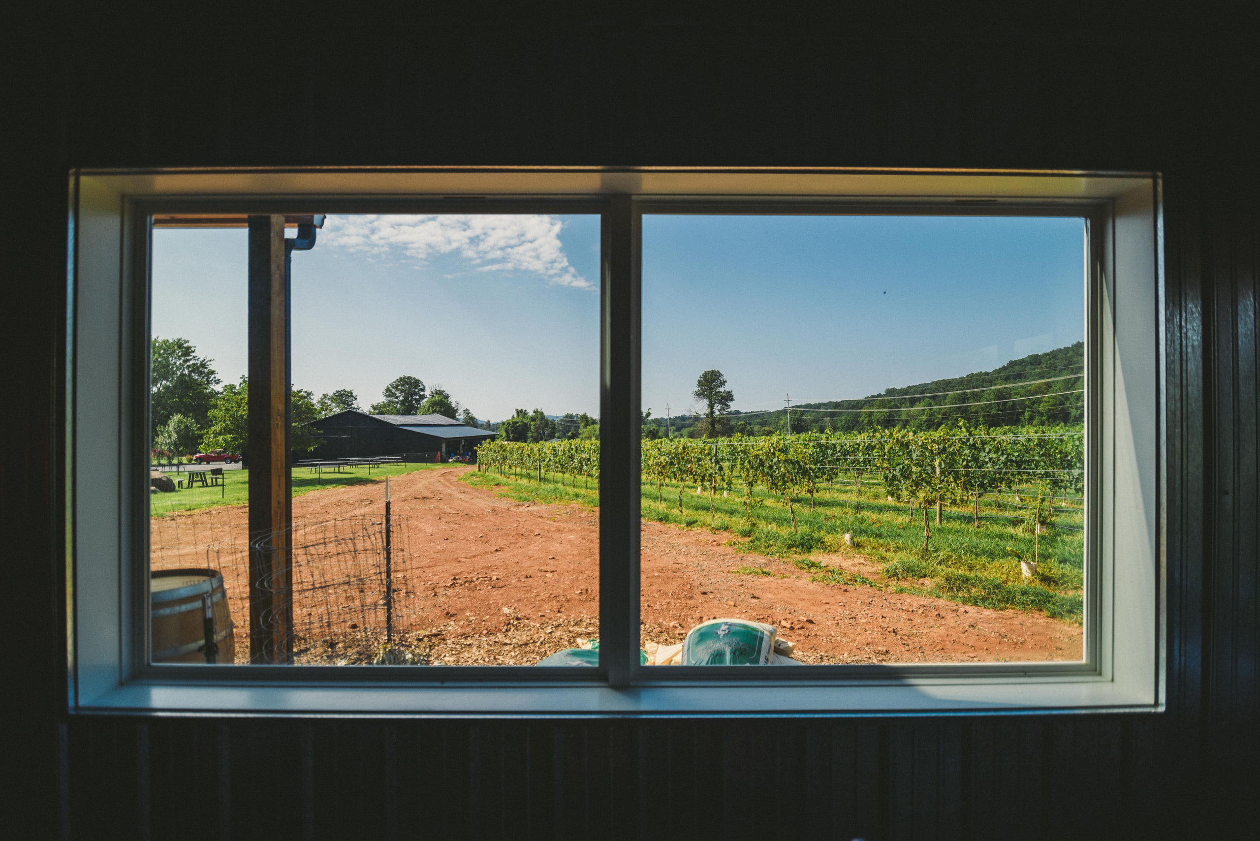 Window on the vineyard, framed, an empty venue photographed for its listing.