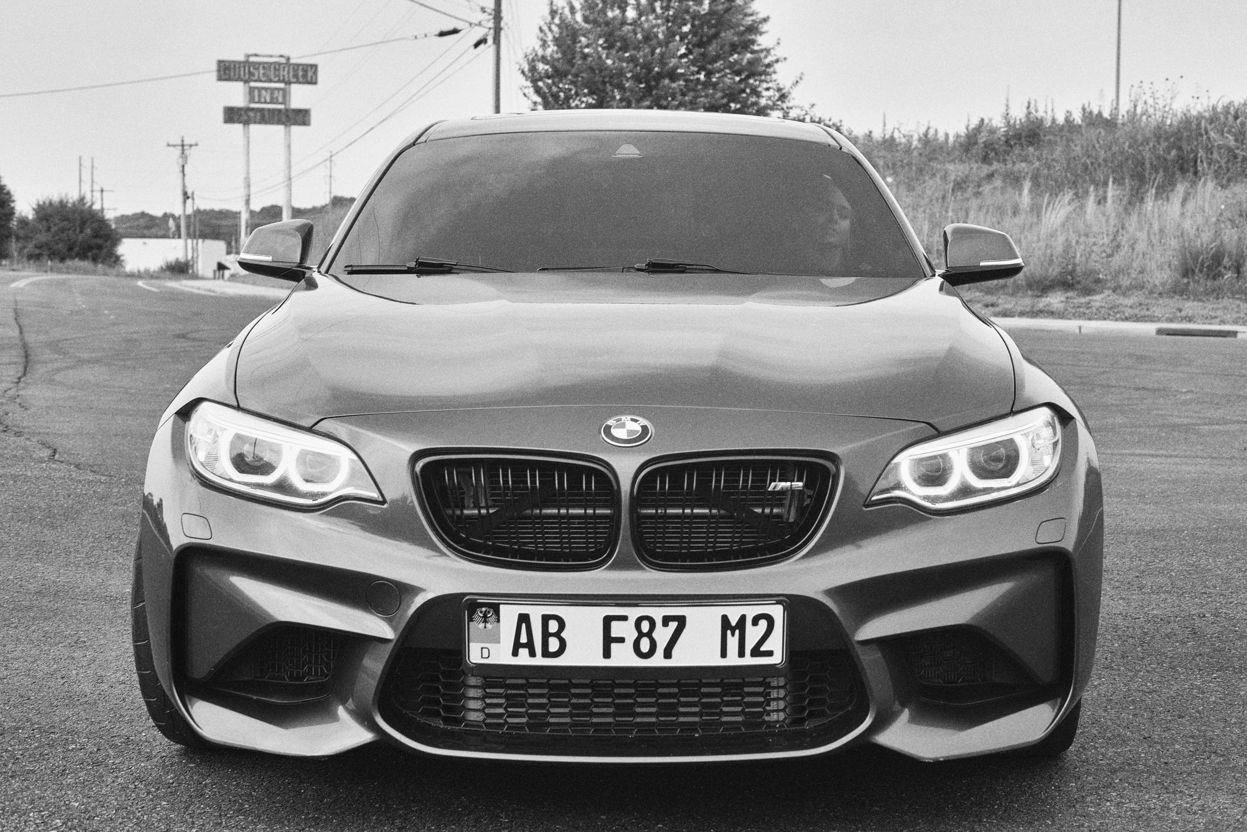 Black and white M2 head-on, the grille.