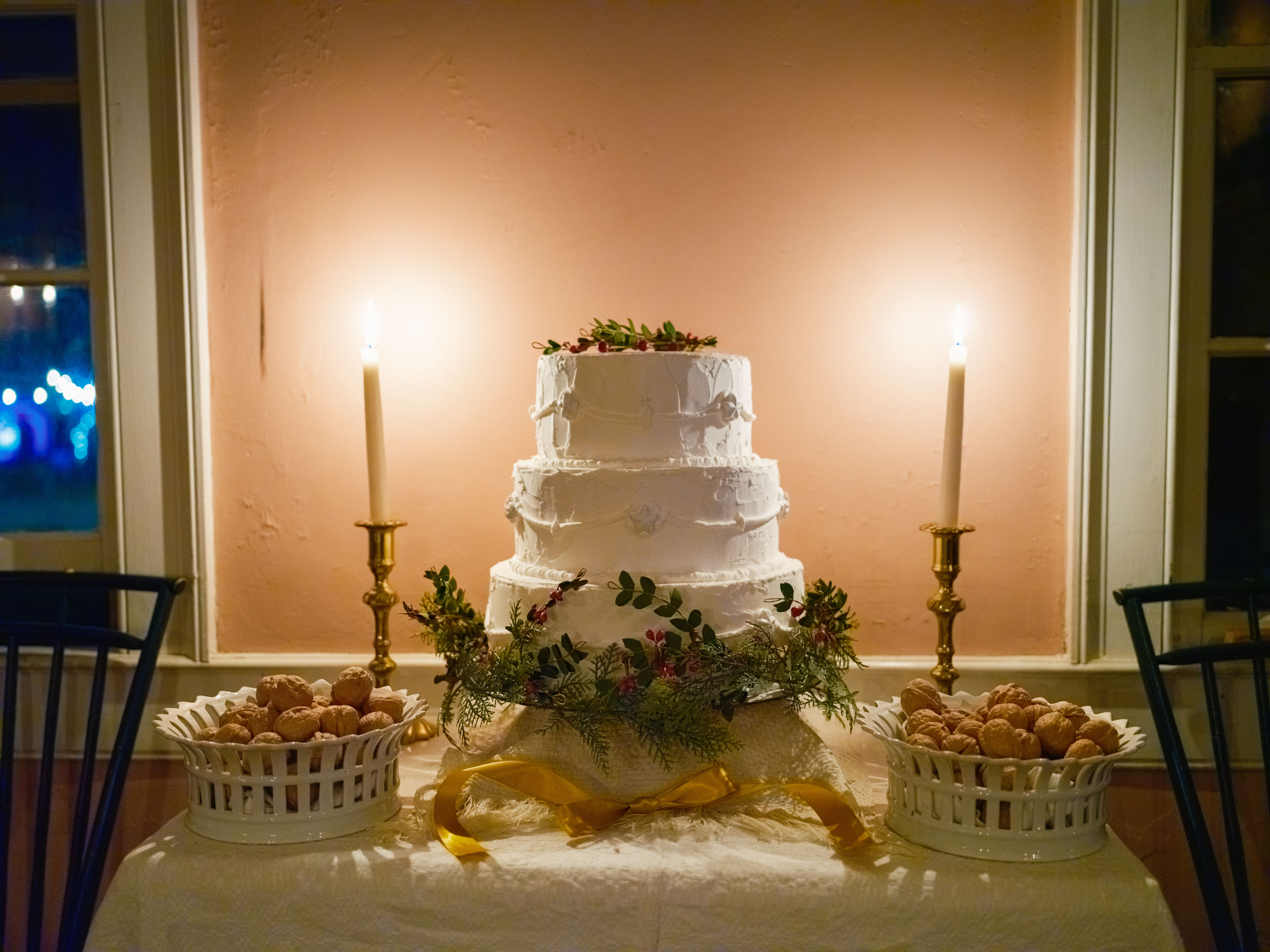 Candlelit table, cake, still life.