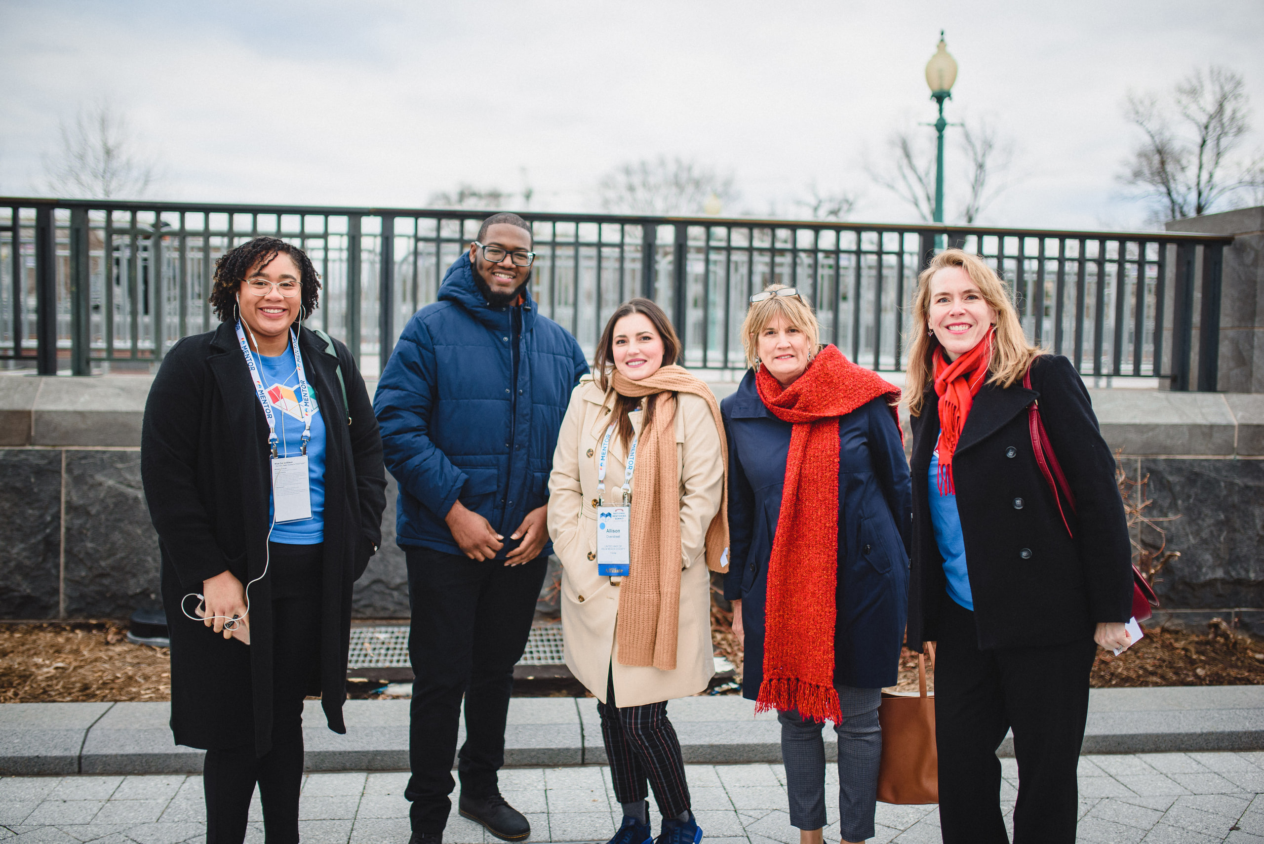 Group on the bridge, winter coats at a conference in Washington, DC.