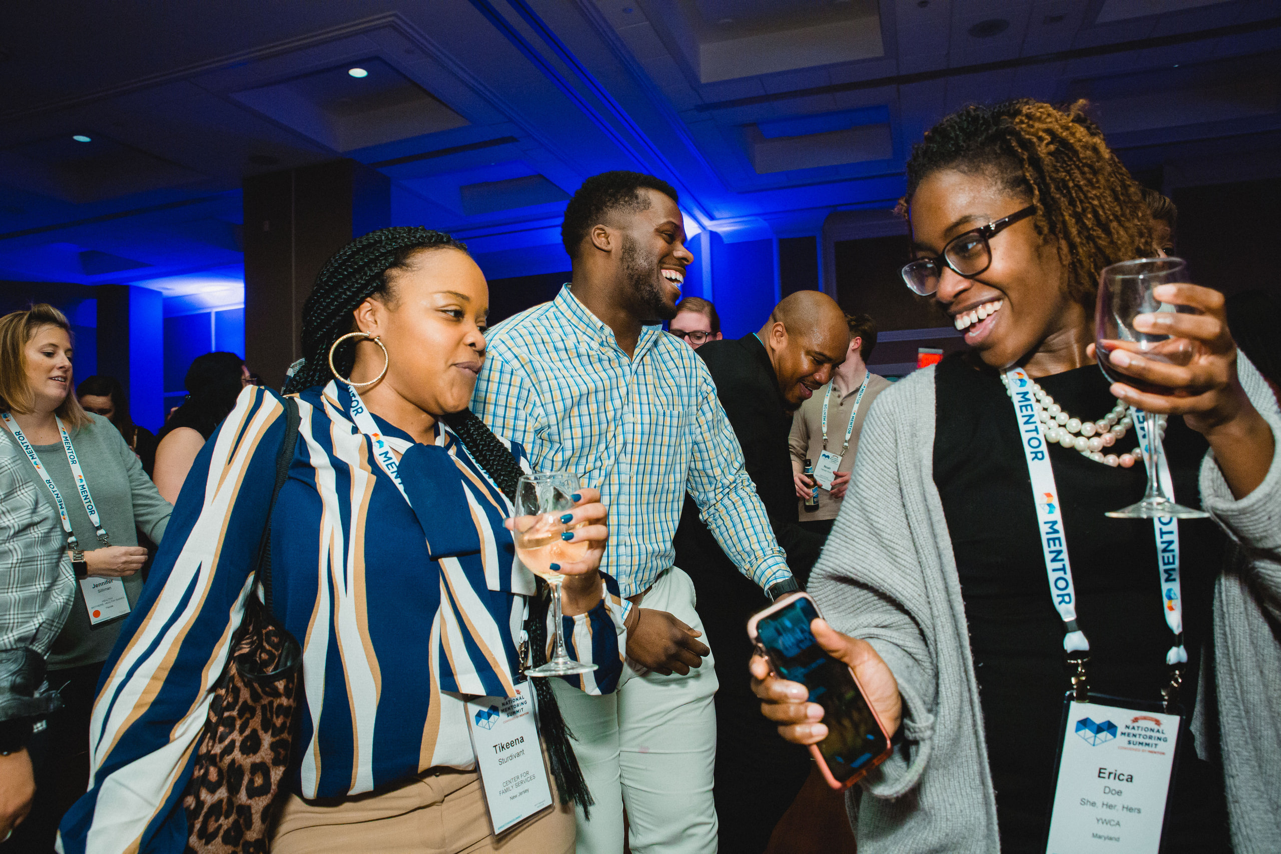 Crowd celebrating, color at a conference in Washington, DC.