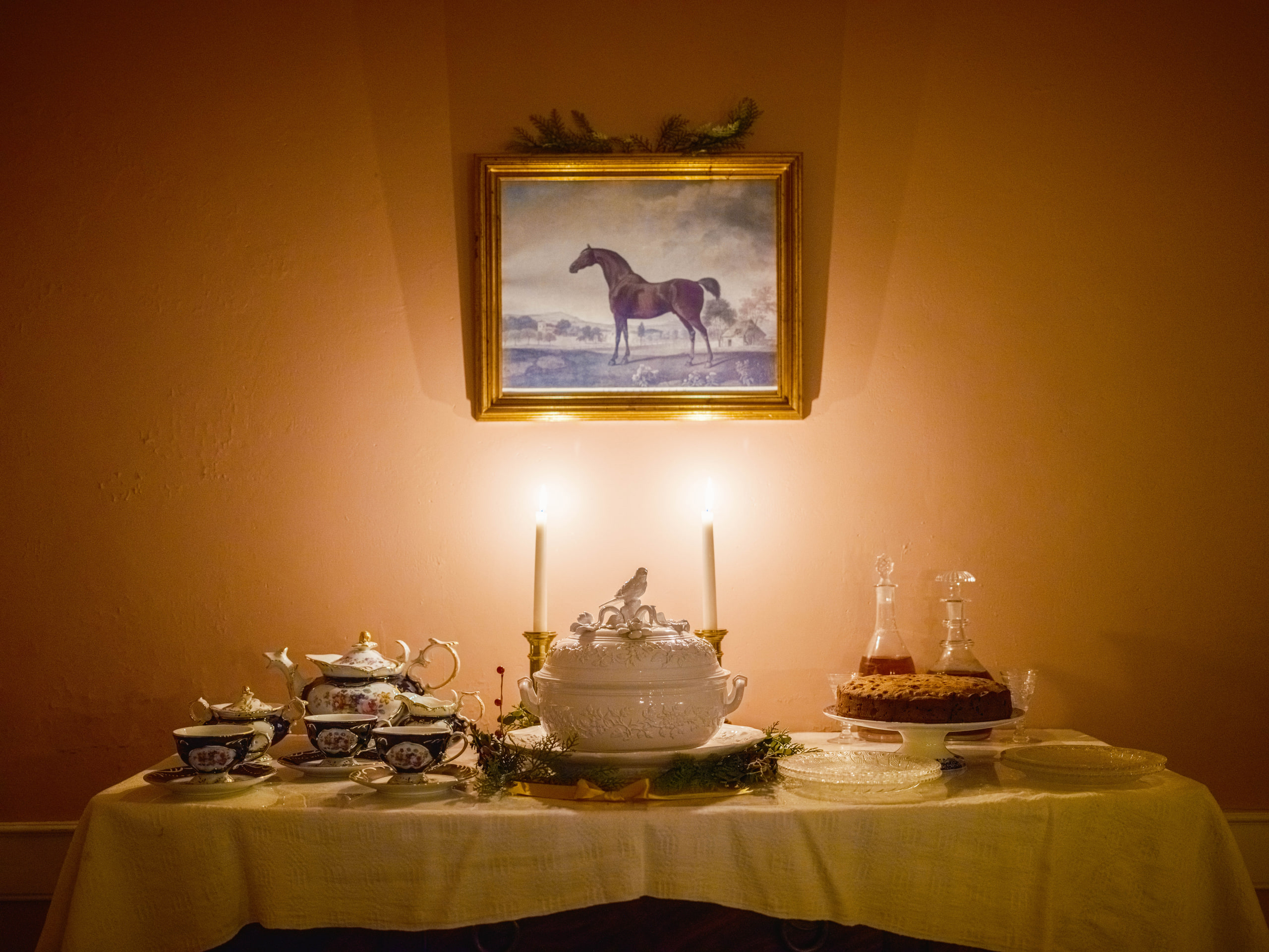 Candlelit table, warm at a community event.