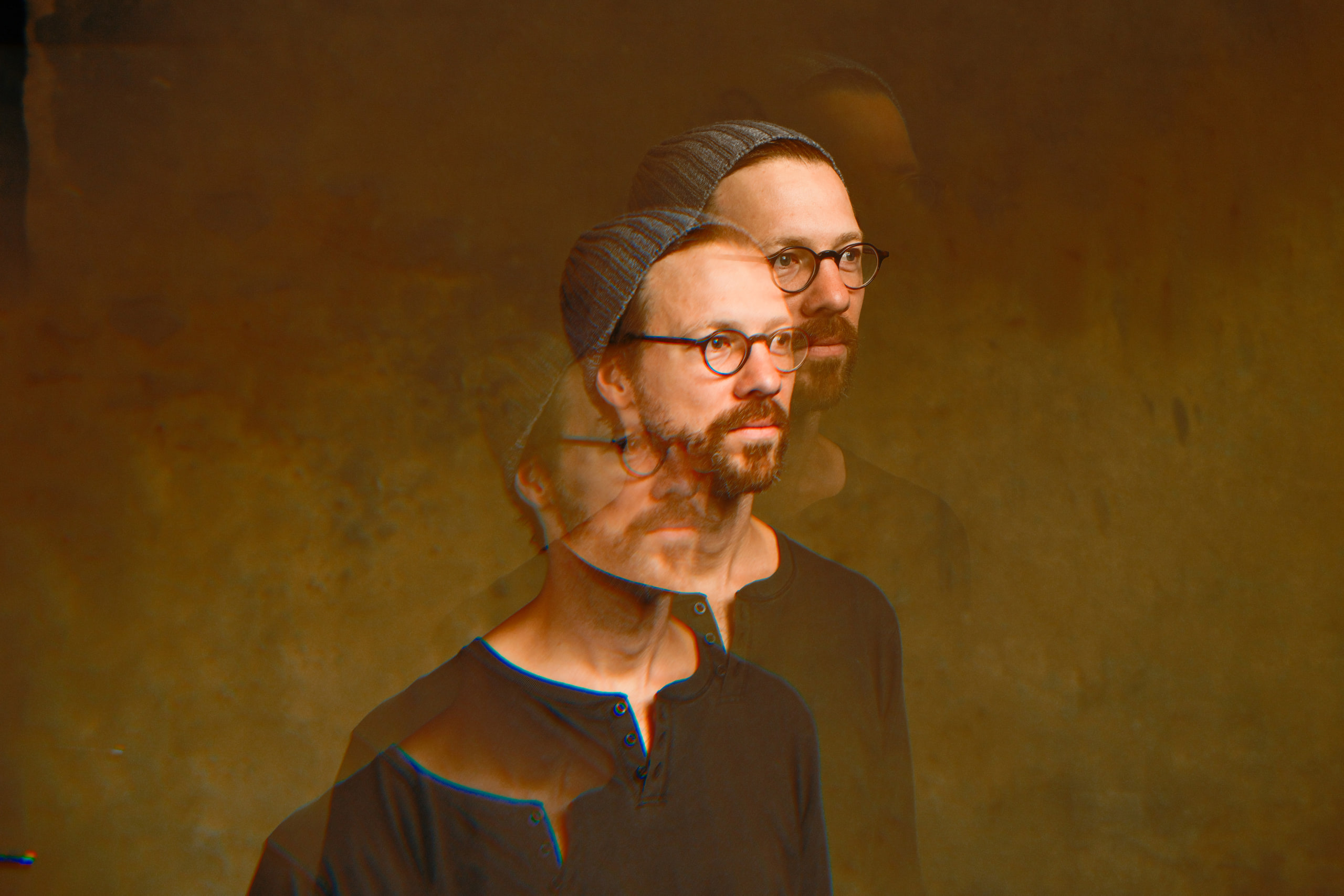 Multiple exposure, the head repeating down the frame.